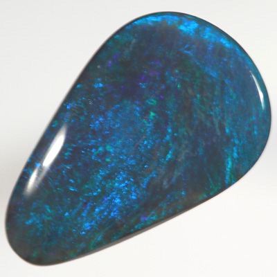 SOLID BLACK OPAL Bright green, turquoise and blue always showing SEE VIDEO
